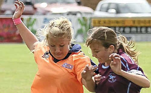 Sarah Orman is strong on the ball for the 16-years girls. Sarah Orman is strong on the ball for the 16-years girls.